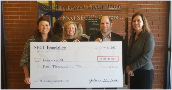 Image of check presentation to EducationNC for $40,000