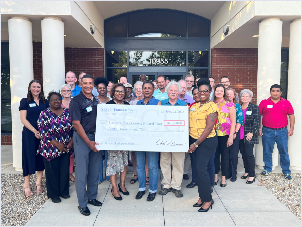 Group Check Presentation for Southern Pines Land & Housing Trust