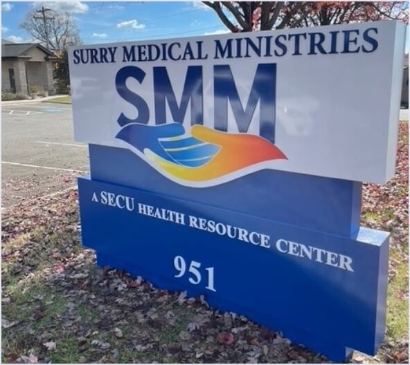 Facility sign for Surry Medical Ministries and SECU Health Resource Center 